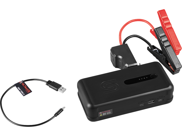 Fekete hordozható akkumulátor indító piros és fekete indítókábelekkel, valamint USB töltőkábellel.