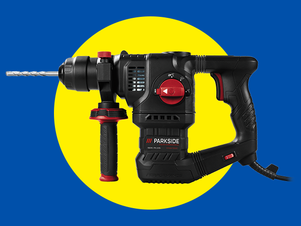 Fekete fúrókalapács fúrófejjel, sárga körön, kék háttér előtt.