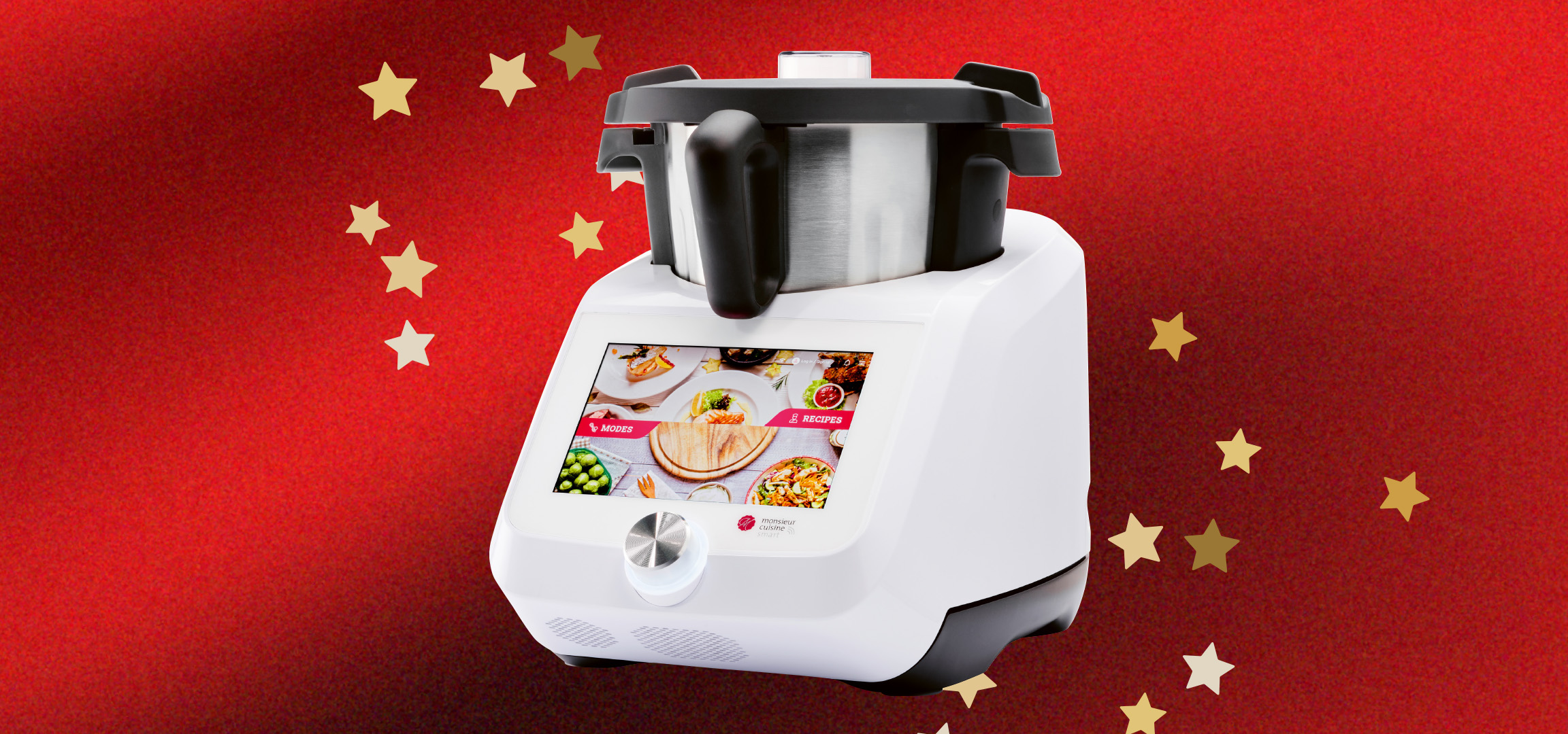 Fehér Monsieur Cuisine okos konyhai robotgép piros, csillagos háttér előtt.