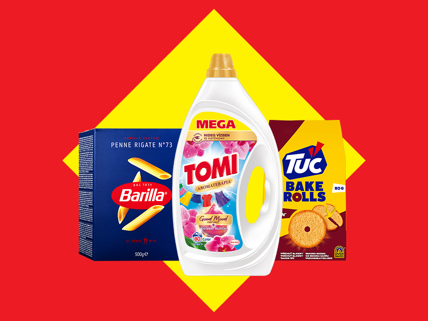 Barilla tészta, Tomi mosószer és TUC Bake Rolls keksz egy piros-sárga háttér előtt.